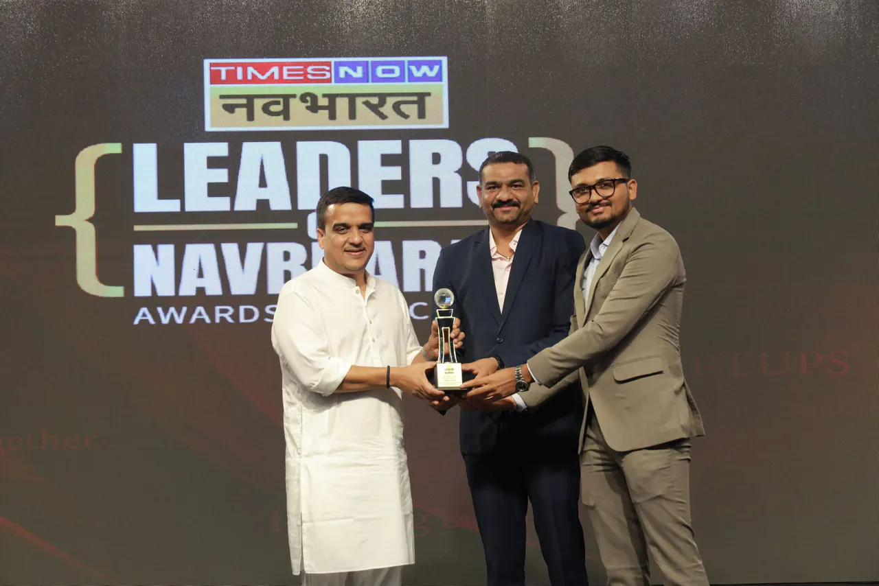 ORKAY receiving the Times Now Navbharat Leaders of Navbharat trophy for Fastest Growing Tile Manufacturer and Exporter of the Year from Harsh Sanghavi