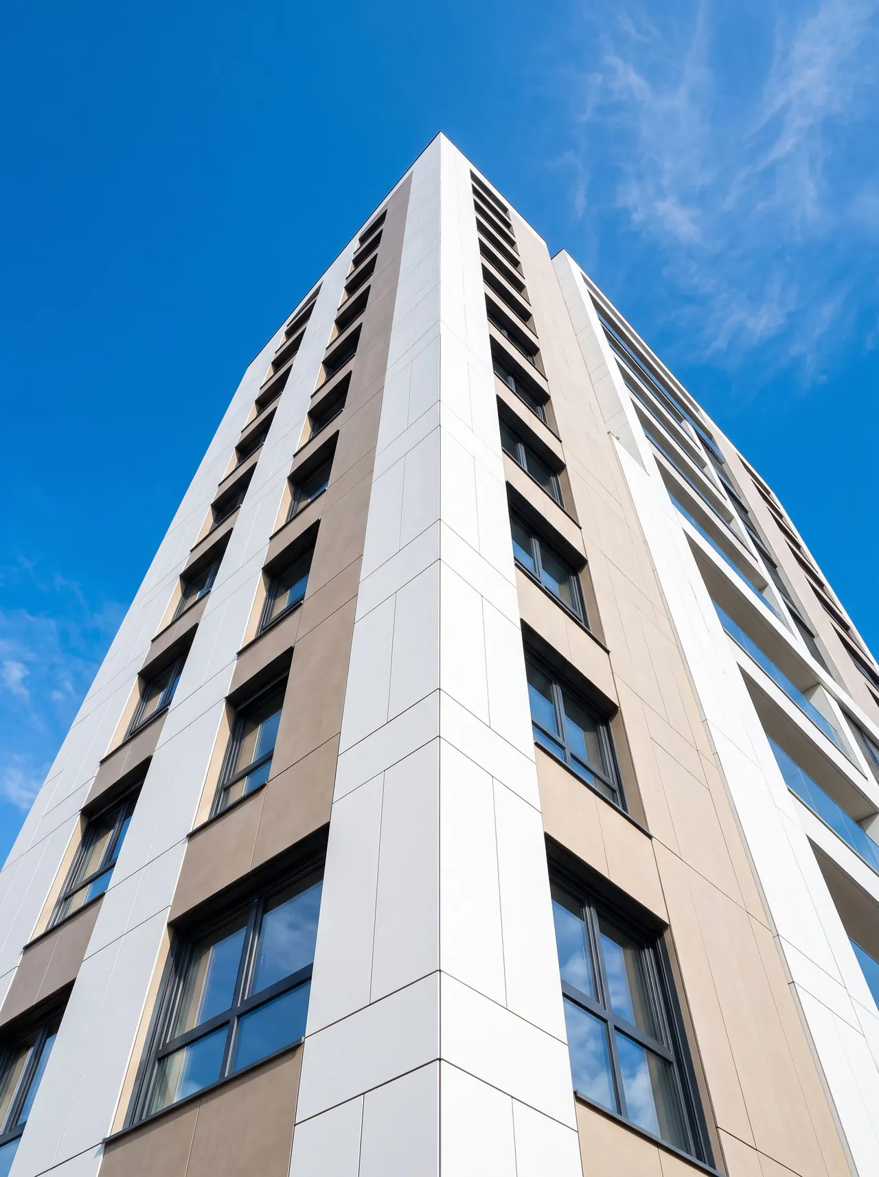 Building facade clad in large-format ORKAY porcelain
